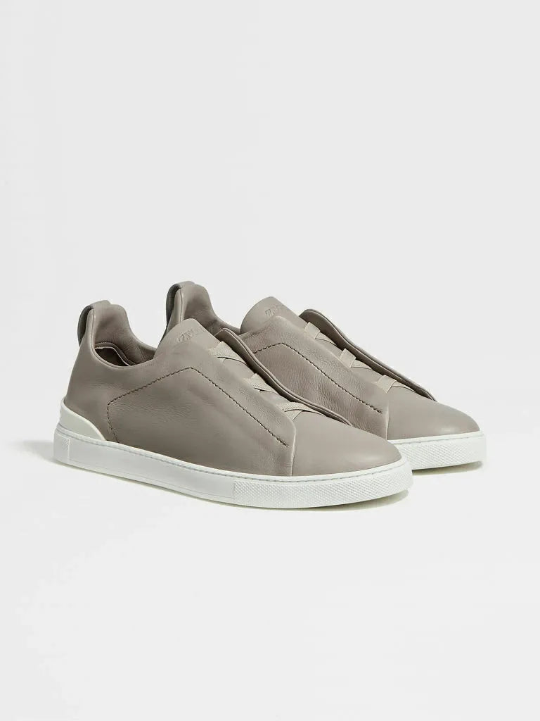 Triple Stitch Cuero Zapatillas – Gris